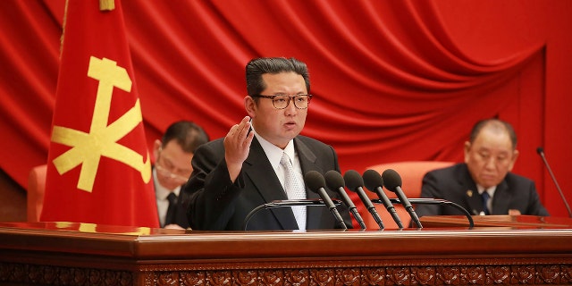 North Korean leader Kim Jong Un, center, attends a meeting of the Central Committee of the ruling Workers' Party in Pyongyang, North Korea. The photo was taken during Dec. 27 - Dec. 31, 2021, according to the source. (Korean Central News Agency/Korea News Service via AP)