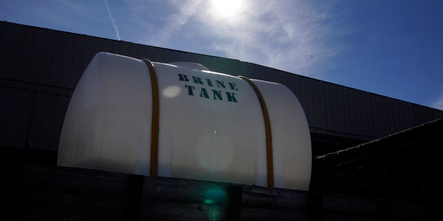 A Georgia Department of Transportation brine tank is seen atop a truck, ahead of a winter storm at the GDOT's Maintenance Activities Unit location on Friday, Jan. 14, 2022, in Forest Park, Ga. (AP Photo/Brynn Anderson)