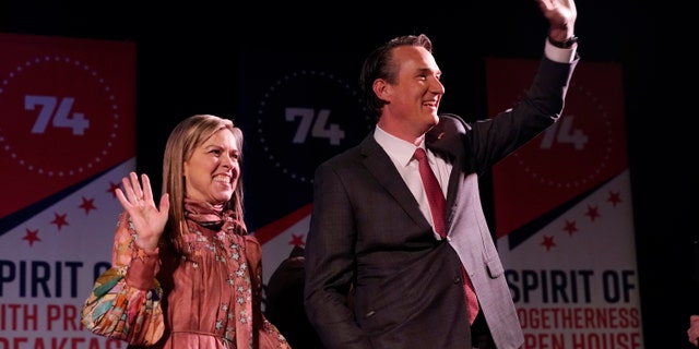 Virginia Gov.-elect Glenn Youngkin and his wife Suzanne greet supporters at a reception Friday Jan. 14, 2022, in Richmond, Va. Youngkin will be sworn in as Virginia's 74th Governor Saturday. (AP Photo/Steve Helber)