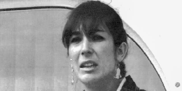 Ghislaine Maxwell, daughter of late British publisher Robert Maxwell, reads a statement expressing her family's gratitude to Spanish authorities after recovery of his body, in Nov. 7, 1991, in Tenerife, Spain. (AP Photo/Dominique Mollard, File)