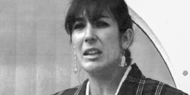 Ghislaine Maxwell, daughter of late British publisher Robert Maxwell, reads a statement expressing her family's gratitude to Spanish authorities after recovery of his body, in Nov. 7, 1991, in Tenerife, Spain. (AP Photo/Dominique Mollard, File)