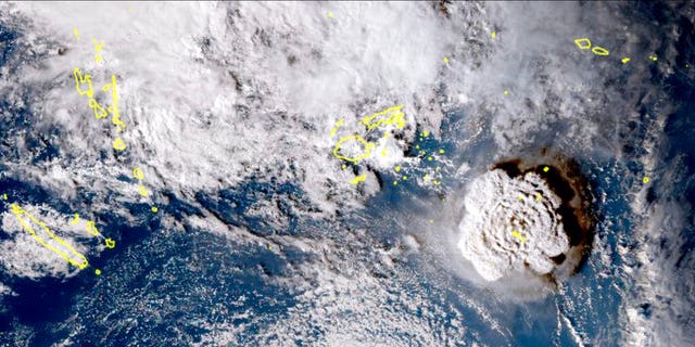 In this satellite image taken by Himawari-8, a Japanese weather satellite, and released by the agency, shows an undersea volcano eruption at the Pacific nation of Tonga Saturday, Jan. 15, 2022. An undersea volcano erupted in spectacular fashion near the Pacific nation of Tonga on Saturday, sending large waves crashing across the shore and people rushing to higher ground. (Japan Meteorology Agency via AP)