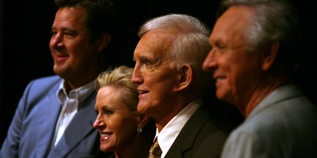 Tammy Genovese, second left, Country Music Association Chief Operating Officer, poses for a photo with Vince Gill, left, Ralph Emery and Mel Tillis, right, Tuesday, Aug. 7, 2007, in Nashville, Tennessee, after it was announced that the three men will be inducted into the Country Music Hall of Fame. (Associated Press)