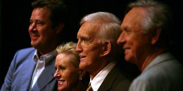 Tammy Genovese, second left, Country Music Association Chief Operating Officer, poses for a photo with Vince Gill, left, Ralph Emery and Mel Tillis, right, Tuesday, Aug. 7, 2007, in Nashville, Tennessee, after it was announced that the three men will be inducted into the Country Music Hall of Fame. (Associated Press)