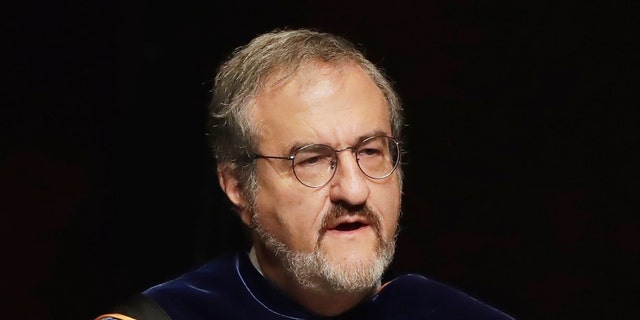 In this Jan. 30 2017, file photo, University of Michigan President Mark Schlissel speaks during a ceremony at the university, in Ann Arbor, Mich. Schlissel has been removed as president of the University of Michigan (AP Photo/Carlos Osorio, File)