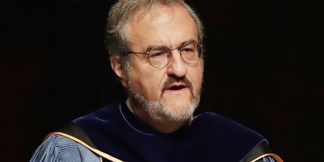 In this Jan. 30 2017, file photo, University of Michigan President Mark Schlissel speaks during a ceremony at the university, in Ann Arbor, Mich. Schlissel has been removed as president of the University of Michigan (AP Photo/Carlos Osorio, File)