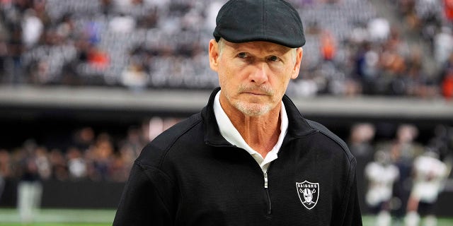 FLas Vegas Raiders general manager Mike Mayock walks the sideline during an NFL football game against the Chicago Bears, Sunday, Oct. 10, 2021, in Las Vegas. On Monday, Jan. 17, 2022, the Las Vegas Raiders announced they have fired Mayock after three seasons and will begin a search for a coach and GM following their second playoff berth in the past 19 seasons.