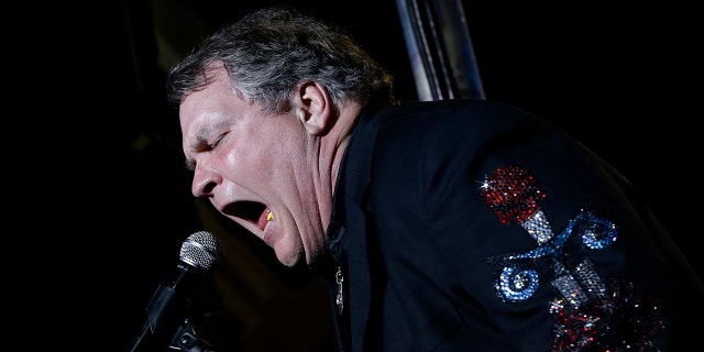 Singer Meat Loaf performs in support of Republican presidential candidate and former Massachusetts Gov. Mitt Romney at the football stadium at Defiance High School in Defiance, Ohio, Thursday, Oct. 25, 2012. (AP Photo/Charles Dharapak, File)