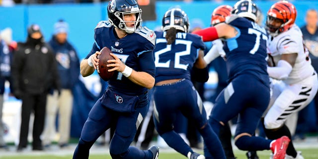 Tennessee Titans quarterback Ryan Tannehill (17) works against the Cincinnati Bengals during the first half of an NFL divisional round playoff football game, Saturday, Jan. 22, 2022, in Nashville, Tenn.