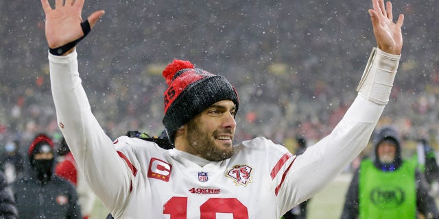 San Francisco 49ers' Jimmy Garoppolo celebrates after an NFC divisional playoff NFL football game Saturday, Jan. 22, 2022, in Green Bay, Wis. The 49ers won 13-10 to advance to the NFC Chasmpionship game.