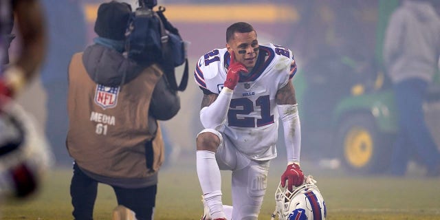Buffalo Bills free safety Jordan Poyer (21) kneels on the field after an NFL divisional round playoff football game against the Kansas City Chiefs, Sunday, Jan. 23, 2022, in Kansas City, Mo. The Chiefs won 42-36 in overtime.