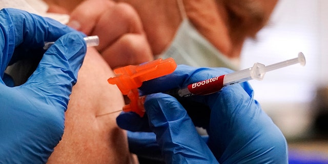 A Massachusetts resident gets the booster vaccine. (AP Photo/Charles Krupa, File)