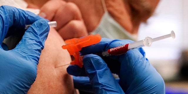 A Massachusetts resident gets the booster vaccine. (AP Photo/Charles Krupa, File)