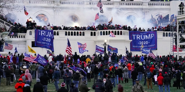 Violent protesters, loyal to then-President Trump, storm the Capitol in Washington on Jan. 6, 2021.