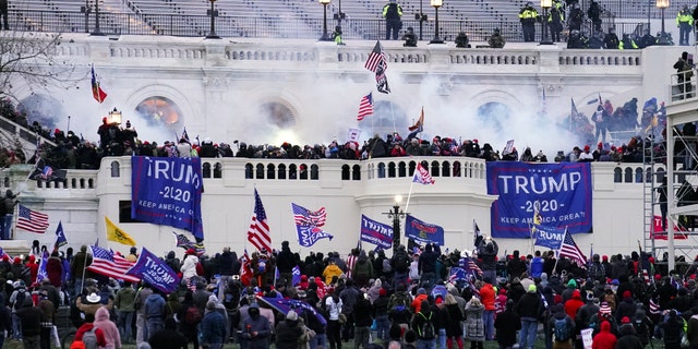 Violent protesters, loyal to then-President Trump, storm the Capitol in Washington on Jan. 6, 2021.