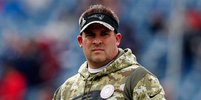 LÊER - New England Patriots offensive coordinator Josh McDaniels looks on prior to an NFL football game Nov. 14, 2021, in Foxborough, Massa. The Las Vegas Raiders have made a request to interview the Patriots' McDaniels for their head coach opening. A person familiar with the search said Thursday, Jan.. 27, 2022, the Raiders made the request to speak with McDaniels about filling the void left when Jon Gruden resigned in October. The person spoke on condition of anonymity because the team was not announcing its candidates.