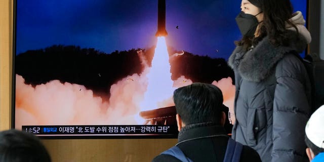 A TV screen shows a file image of North Korea's missile launch during a news program at the Seoul Railway Station in Seoul, South Korea, Sunday, Jan. 30, 2022. North Korea on Sunday fired what appeared to be the most powerful missile it has tested since U.S. President Joe Biden took office, as it revives its old playbook in brinkmanship to wrest concessions from Washington and neighbors amid a prolonged stalemate in diplomacy. (AP Photo/Ahn Young-joon)