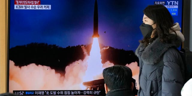 A TV screen shows a file image of North Korea's missile launch during a news program at the Seoul Railway Station in Seoul, South Korea, Sunday, Jan. 30, 2022. North Korea on Sunday fired what appeared to be the most powerful missile it has tested since U.S. President Joe Biden took office, as it revives its old playbook in brinkmanship to wrest concessions from Washington and neighbors amid a prolonged stalemate in diplomacy. (AP Photo/Ahn Young-joon)