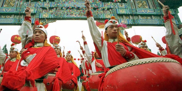 In this 2009 file photo, drum dancers perform at Beijing Spring Festival as part of city's Chinese Lunar New Year celebrations.