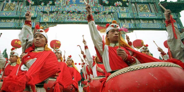 In this 2009 file photo, drum dancers perform at Beijing Spring Festival as part of city's Chinese Lunar New Year celebrations.