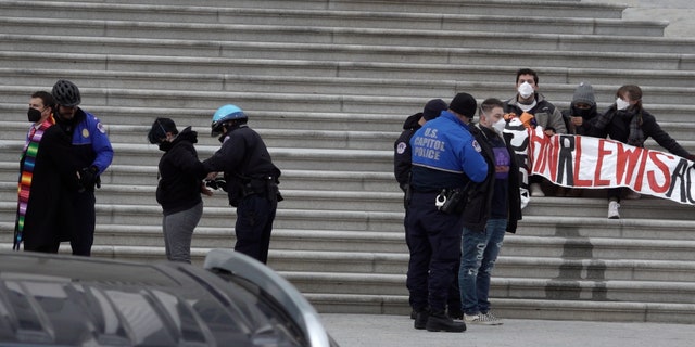Hunger strikers were arrested on Tuesday after refusing to leave the U.S. Capitol steps