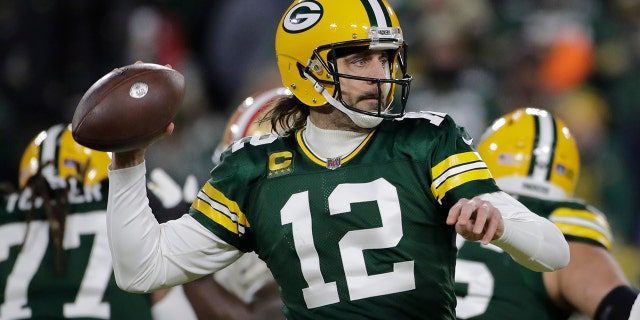 Green Bay Packers' Aaron Rodgers throws during the first half of an NFC divisional playoff NFL football game against the San Francisco 49ers Saturday, Jan. 22, 2022, a Green Bay, Wis.