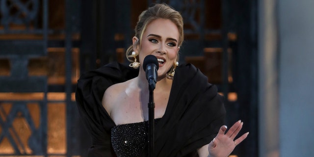 Adele is postponing her Las Vegas residency.