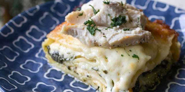 This Chicken Alfredo lasagna recipe from OrWhateverYouDo.com is made with spinach.