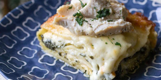 This Chicken Alfredo lasagna recipe from OrWhateverYouDo.com is made with spinach.