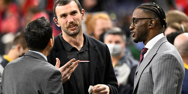 Andrew Luck speaks on the field before the 2022 CFP National Championship Game between the Alabama Crimson Tide and the Georgia Bulldogs at Lucas Oil Stadium in Indianapolis on Jan. 10, 2022.