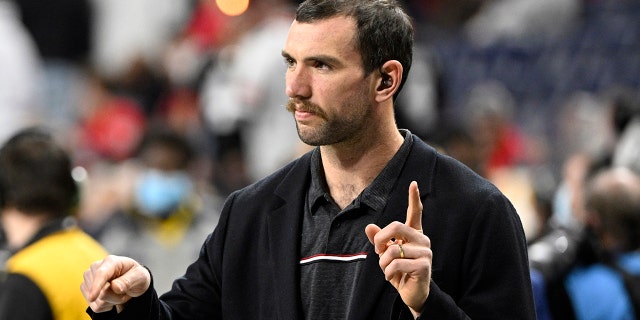 Jan 10, 2022; Indianapolis, IN, USA; Andrew Luck on the field before the 2022 CFP college football national championship game between the Alabama Crimson Tide and the Georgia Bulldogs at Lucas Oil Stadium.