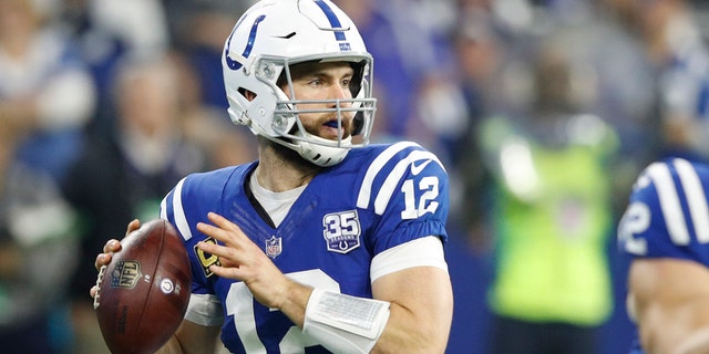 Andrew Luck of the Indianapolis Colts looks to pass in a game against the Dallas Cowboys at Lucas Oil Stadium in Indianapolis on Dec. 16, 2018.
