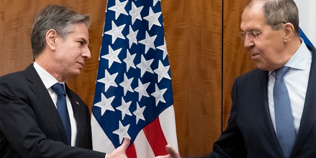 Secretary of State Antony Blinken greets Russian Foreign Minister Sergey Lavrov before their meeting on Jan. 21, 2022, in Geneva, Switzerland.