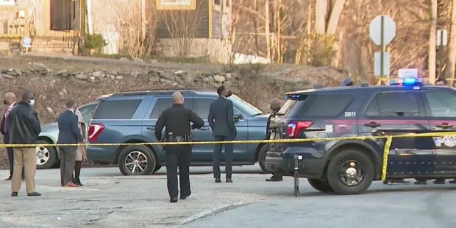 Atlanta investigators at the scene where a 6-month-old child was killed Monday. The child was the second to be killed and third to be shot this year. 