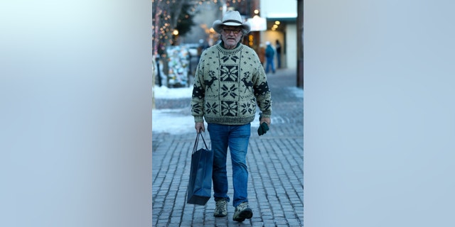 Kurt Russell Is seen in a stylish sweater and cowboy hat in snowy Aspen, Colorado.