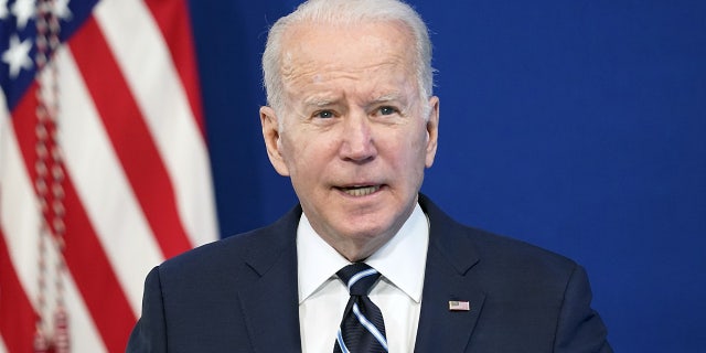 President Joe Biden speaks about the government's COVID-19 response, in the South Court Auditorium in the Eisenhower Executive Office Building on the White House Campus in Washington, Thursday, Jan. 13, 2022. He and Russian President Volodymyr Zelensky are at odds over the likelihood of a Russian invasion of Ukraine. (AP Photo/Andrew Harnik)