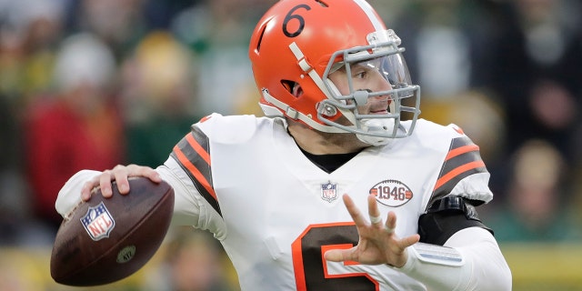 Cleveland Brown Baker Mayfield throws during the first half against the Green Bay Packers Dec. 25, 2021, in Green Bay, Wis.