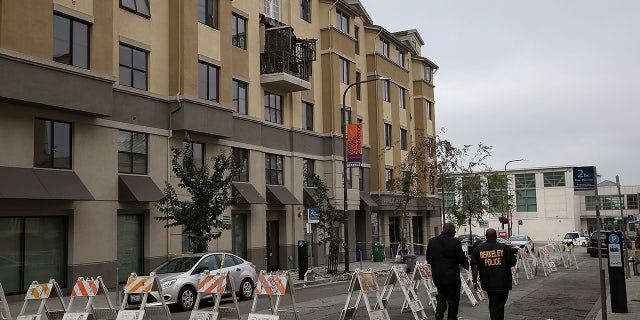 Police remain at the scene of a balcony collapse at an apartment building near UC Berkeley in 2015.