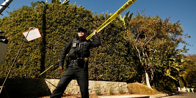 Police cordoned off the area near the Beverly Hills home of Jacqueline Avant. (Al Seib / Los Angeles Times via Getty Images)