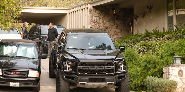 Private security guard the home in Beverly Hills where Jacqueline Avant, the wife of music producer Clarence Avant, was shot and killed. (Al Seib / Los Angeles Times via Getty Images).