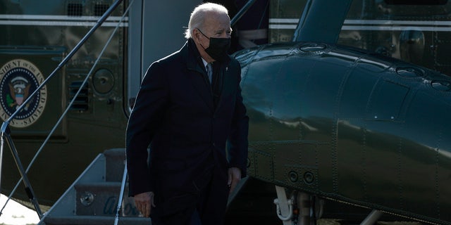 President Joe Biden walks across the South Lawn after returning to the White House on Marine One on January 10, 2022 in Washington, DC. (Photo by Anna Moneymaker/Getty Images)