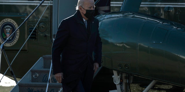 President Joe Biden walks across the South Lawn after returning to the White House on Marine One on January 10, 2022 in Washington, DC. (Photo by Anna Moneymaker/Getty Images)