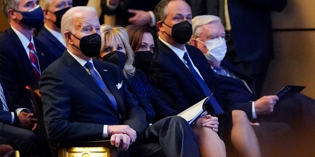 President Joe Biden, first lady Jill Biden, Vice President Kamala Harris and her husband Doug Emhoff attend a memorial service for former Senate Majority Leader Harry Reid at the Smith Center in Las Vegas, Saturday, Jan. 8, 2022.
