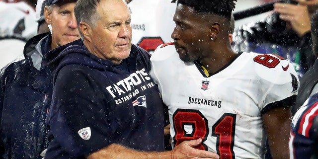 After the game, Patriots head coach Bill Belichick, left, sought out Buccaneers wide receiver Antonio Brown. The New England Patriots hosted the Tampa Bay Buccaneers in a regular season Sunday Night Football game at Gillette Stadium.