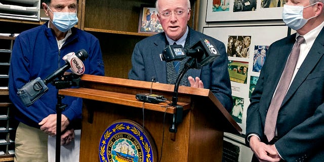 New Hampshire Secretary of State Bill Gardner, center, announces he will step down from office during a news conference, Monday Jan. 3, 2022 at the Statehouse in Concord, N.H. Gardner is the nation's longest-serving Secretary of State. From left are Senior Deputy Sect. of State Robert Ambrose, Gardner and Deputy Sect. of State David Scanlan. (AP Photo/Holly Ramer)