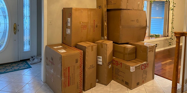 These boxes piled up at the Kamur home in New Jersey in January 2022.