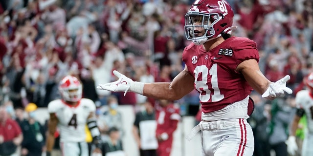 Alabama's Cameron Latu reacts after catching a touchdown pass during the second half of the College Football Playoff championship football game against Georgia Monday, Jan. 10, 2022, in Indianapolis.