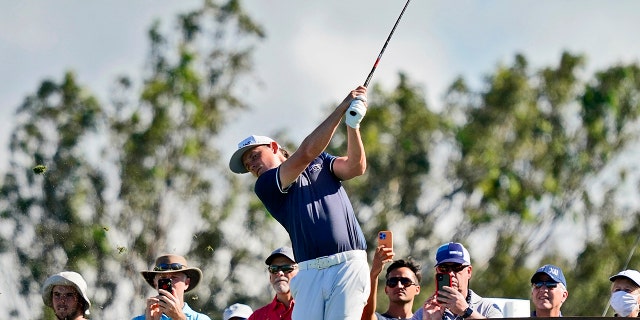 Cameron Smith plays his shot from the 11th tee during the second round of the Tournament of Champions golf event, Friday, Jan. 7, 2022, at Kapalua Plantation Course in Kapalua, Hawaii.