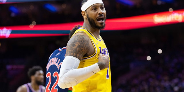 Los Angeles Lakers forward Carmelo Anthony reacts with fans during the third quarter against the Philadelphia 76ers Jan. 27, 2022, at Wells Fargo Center in Philadelphia.