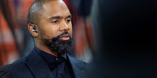 Charles Woodson works as an analyst before the Big Ten Football Championship between the Iowa Hawkeyes and the Michigan Wolverines at Lucas Oil Stadium Dec. 4, 2021, in Indianapolis.